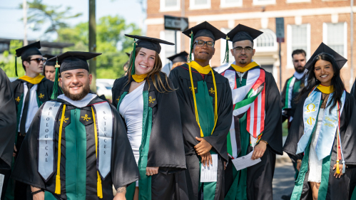 Several graduates in regalia.
