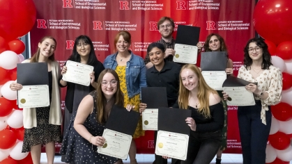 A group of students holding certificates.