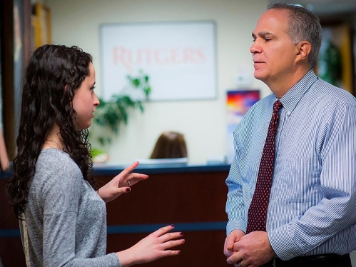 A student talking to an advisor.