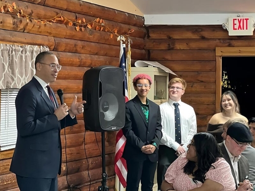 President Holloway speaking to students at Helyar House.