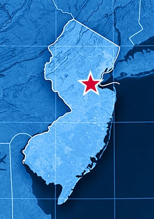 Satellite view of New Jersey with a star indicating the location of New Brunswick in the northeastern section of Central New Jersey..